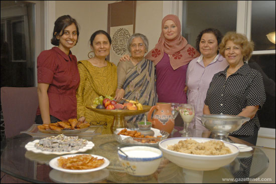 Abida Adnan, wife of Dr. Muhammed Awaisi, hosts a 2008 Ramadan dinner with Naz and other Hampshire mosque supporters